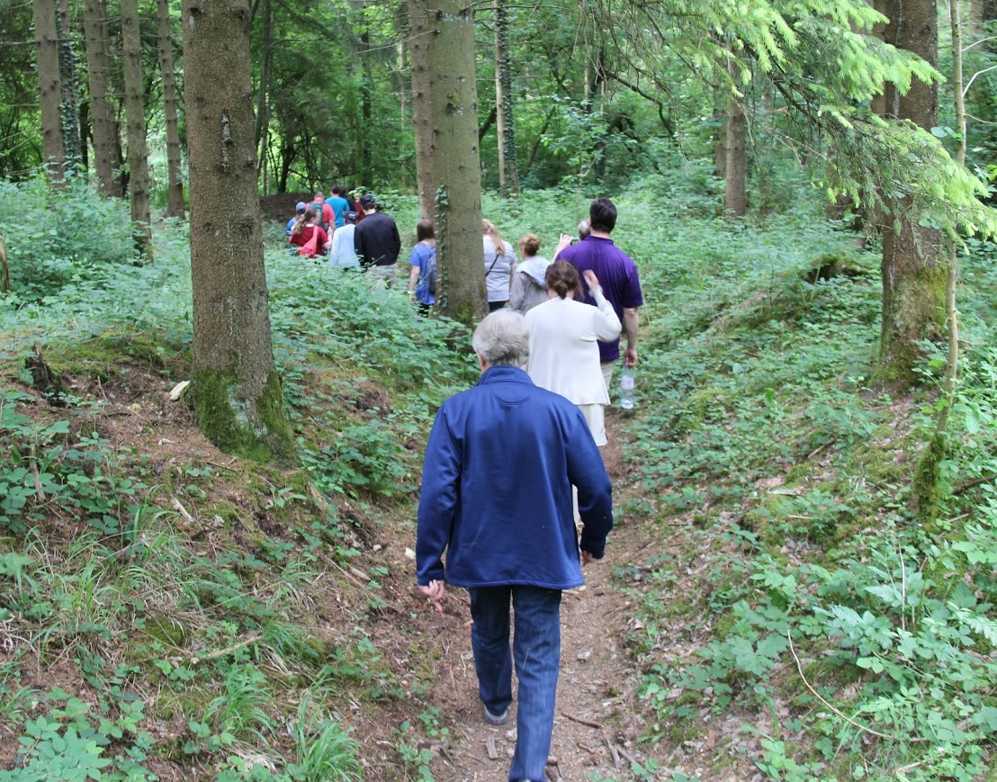 The UU-UTM travelers follow the path of a French communication trench on May 27, 2018, during a daylong tour of the site of the 1916 Battle of Verdun.