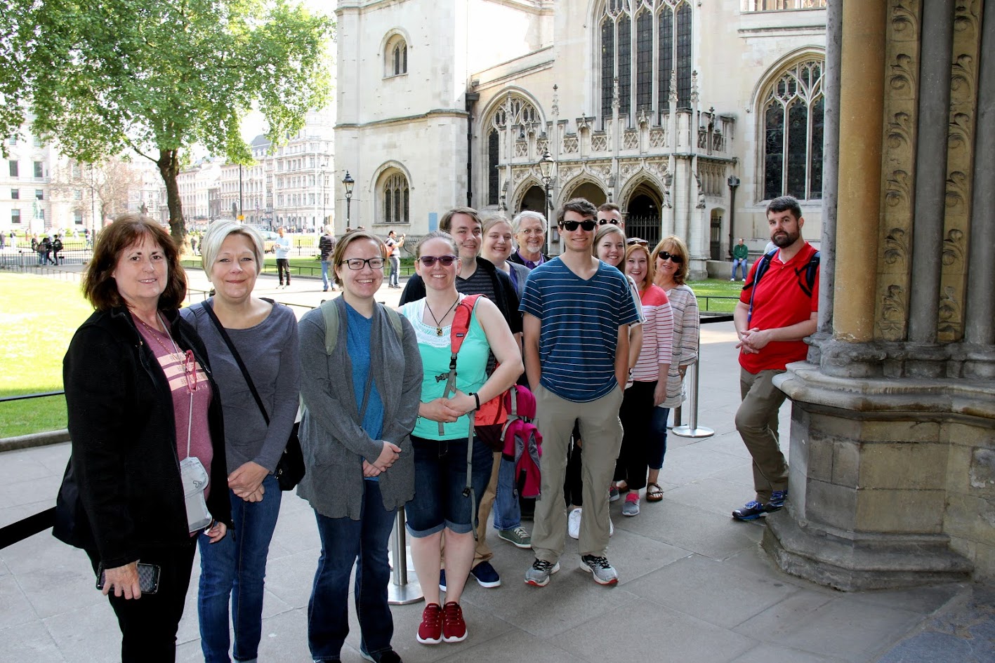 The Great War trip voyagers prepare to enter Westminster Abbey in London on the morning of May 22, 2018. They are (left to right) Jeanne Reed, Wendy Lay, Mary Long, Emily Hedges, Micah Pinkley, Susannah Murphine, Rick Ricard, Samuel Walgren, Ansley Moore, Alex Carr (behind Moore, face partially obscured), Caraline Rickard, Ronda Rickard, and Christopher Ray.