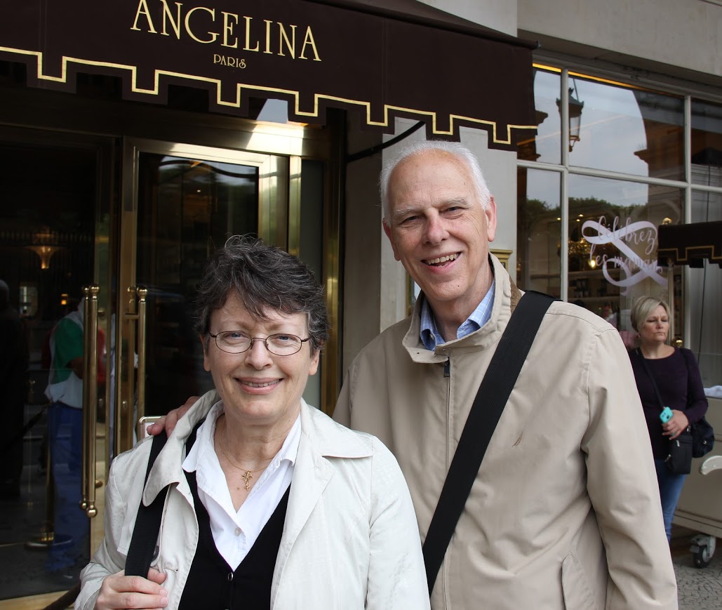 Drs. Stephen and Alice-Catherine Carls, the leaders of the World War I trip to Western Europe, stand in front of the Angelina Tea Room on the Rue de Rivoli in Paris on May 29, 2018. A group stop at Angelina was part of a morning walking tour that Dr. A.-C. Carls conducted.