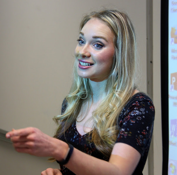 Rutledge History Club President Ali Renckens discusses a club-sponsored movie night at the organization's meeting on March 19, 2018.