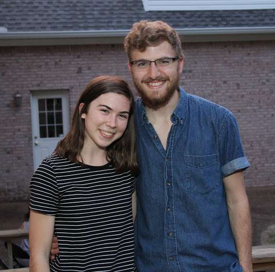 Brittany Staggs and Luke Sower stand together at the end of the Phi Alpha Theta cookout on May 12, 2018.