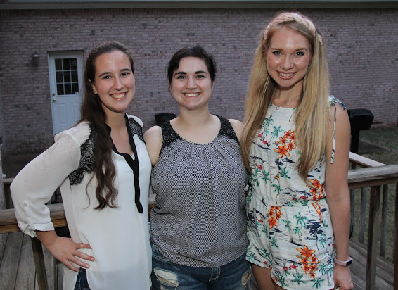 Joanna Butcher (left to right) Lydia Black, and Ali Renckens stand together at the Phi Alpha Theta/History Department Cookout on May 12, 2018.