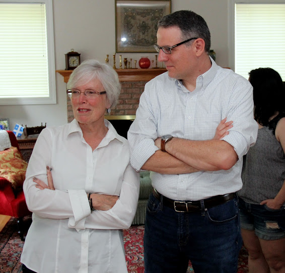 Nancy Thomas and Dr. Keith Bates engage in conversation at the Phi Alpha Theta cookout on May 12, 2018.