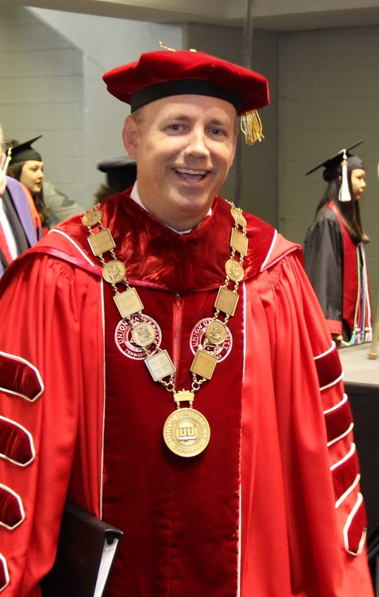Union University President Dr. Samuel W. Dub Oliver participates in the processional at the school's undergraduate commencement services at the Oman Arena on May 19, 2018.