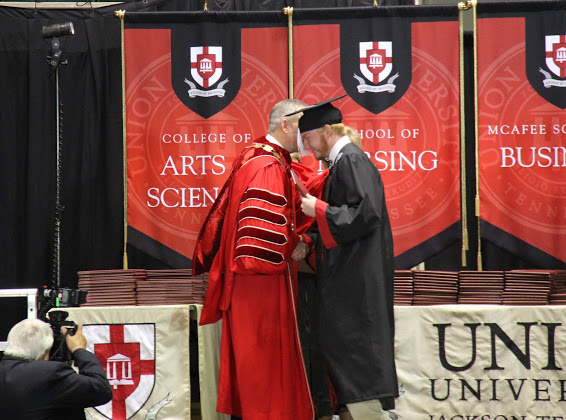 Dr. Samuel W. Dub Oliver congratulates graduating history major Holden Bennett at Union's commencement exercises on May 19, 2018.