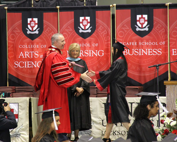Dr. Samuel W. Dub Oliver congratulates graduating Phi Alpha Theta member Katherine Cheshire at Union's spring commencement on May 19, 2018.