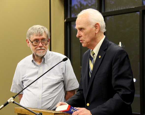 Dr. Stephen Carls (right) expresses gratitude to Dr. Terry Lindley at the history awards banquet on May 3, 2018, for his work as faculty advisor to the Rutledge Honorary History Club from 1992 to 2018. The awards banquet was Lindley's last official activity as club sponsor. Photo by Katherine Cheshire