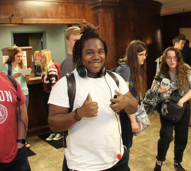 History major Trey Hall gets ready to make a purchase at the Phi Alpha Theta bake sale on April 10, 2019.