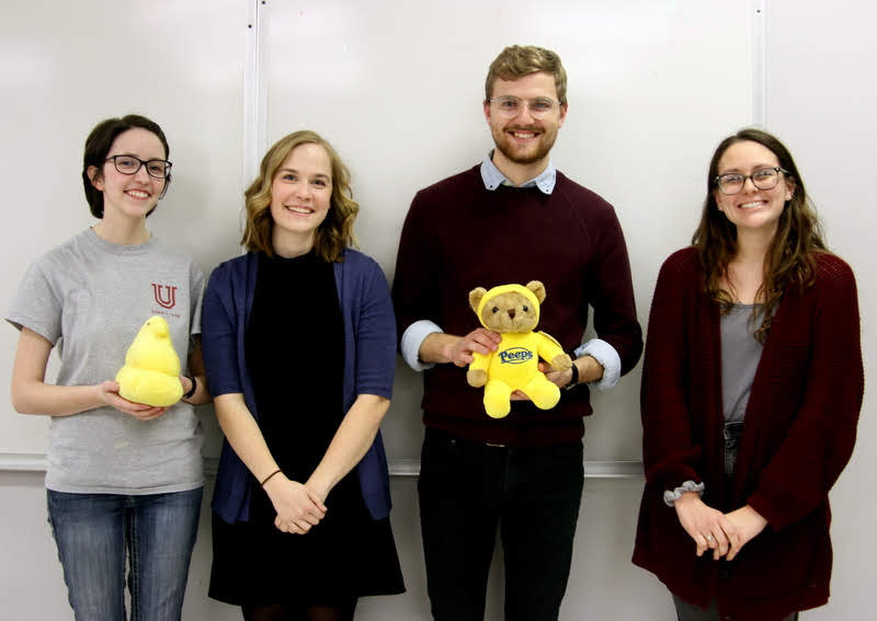Delta-Psi chapter leaders for 2018-2019 team up for a photo at the Phi Alpha Theta plenary meeting on February 26, 2019. They are (left to right) Lauren Butler (president), Megan Ledbetter (secretary), Luke Sower (vice president), and Katie Allison (senator).