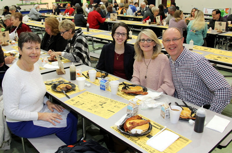 Phi Alpha Theta attendees at the Jackson Old Hickory Rotary Club Pancake Breakfast on March 16, 2019, take a break from eating their food. They are (left to right, looking at camera) Dr. Alice-Catherine Carls, Lauren Butler, Brenda Briley, and Robert Briley.