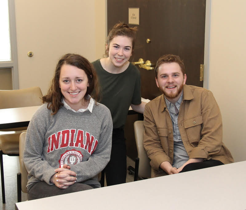 Union University students Brittany Staggs (center) and John Hall, along with Hall's wife Melissa (a Union alumna), await the start of the Phi Alpha Theta conference panel titled 