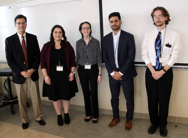Delta-Psi chapter member Lauren Butler (third from left) stands with the other members of her panel, which was titled Entertainment in 20th Century US, at the Phi Alpha Theta conference on March 30, 2019. Others in the photo are: (left to right) Dr. David Snyder (Austin Peay State University), the panel chair/commentator; Mercy Ward (Lee University); Juan Monserrat (Christian Brothers University); and Liam McDermott (Belmont University).