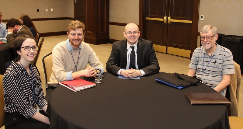Members of the Union University delegation at the Tennessee Phi Alpha Theta Regional Conference at Belmont University on March 30, 2019, wait for the luncheon to begin. They are (left to right) Lauren Butler, Luke Sower, Will Choate, and Dr. Terry Lindley.
