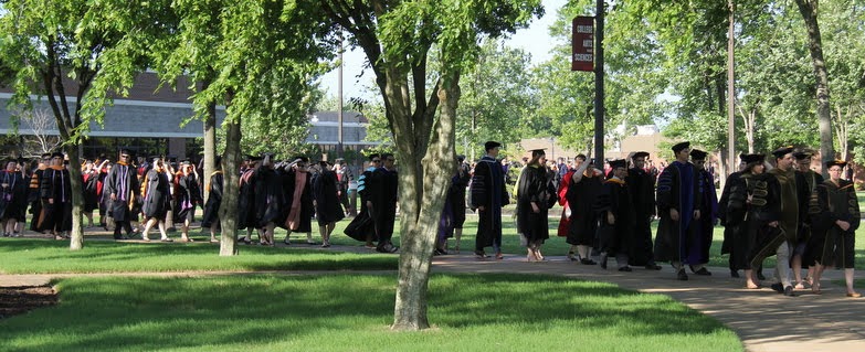 Faculty members participating in Union University's spring undergraduate commencement make their way toward the the graduation site during the processional on May 18, 2019.