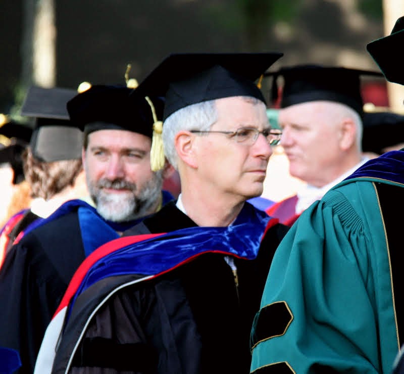 Dr. David Thomas of the history department makes his way toward the graduation site during the processional of Union's undergraduate commencement service on May 18, 2019.