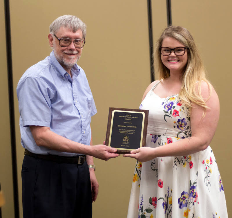 Brianna Hammond receives the History Student Teacher Award from Dr. Terry Lindley at the History Department Awards Banquet on May 2, 2019. Photo by Nicole Grim
