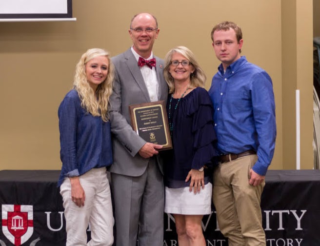 Robert Briley (second from left), the 2019 recipient of the History Alumni Distinguished Achievement Award, stands with members of his family at the history awards banquet on May 2, 2019. They are (left to right) Jennifer, Brenda, and Trebor. Photo by Nicole Grim