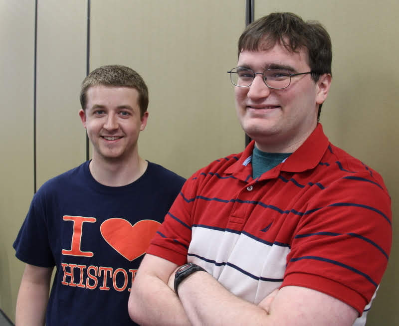 Reagan Smith (left) and Miles Randall wait for the history awards banquet to begin on May 2, 2019.