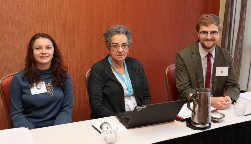 Members of the Phi Alpha Theta convention panel called Latin America & Mexico get ready to start their session on January 3, 2020. They are (left to right) Jessica Thrasher, Dr. Maria Arbelaez (panel chair/commentator), and Luke Sower.