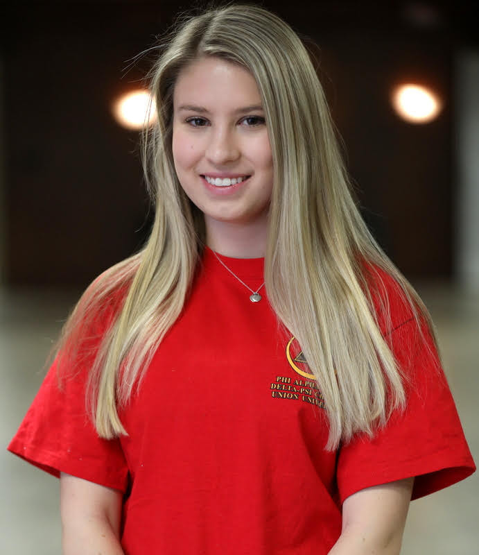 Addison Osborne wears her Phi Alpha Theta T-shirt for the Delta-Psi chapter's T-shirt Spirit Day on March 9, 2020. Photo by Kristi Woody