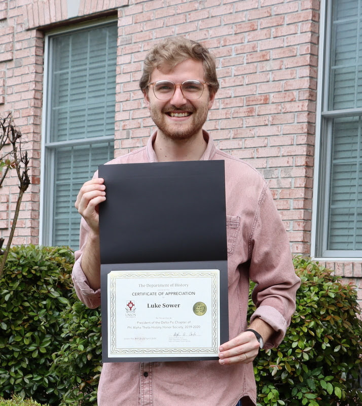 Graduating history major Luke Sower displays his Certificate of Appreciation in May 2020 for his service in 2019-2020 as president of Union's Delta-Psi chapter of Phi Alpha Theta.