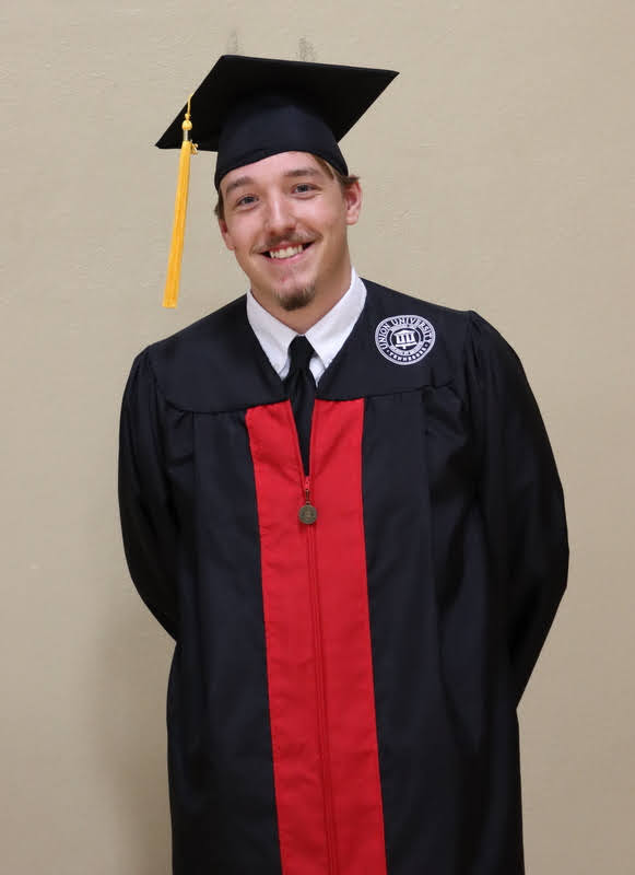 History major Noah Ross prepares to participate in Union University's  commencement for traditional undergraduates on May 15, 2021.