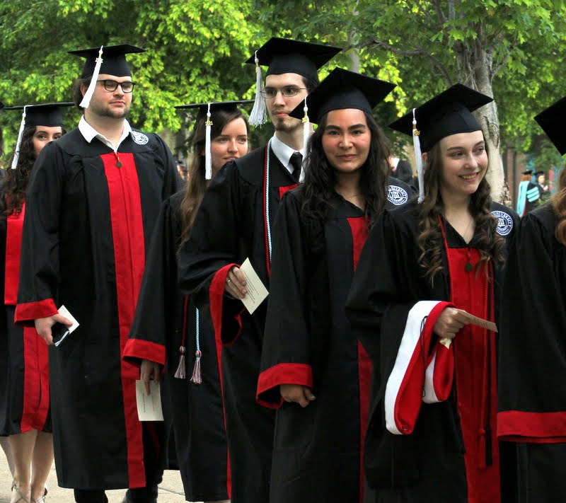 History majors Matthew Latham (in center of photo) and Rebekah Lisle (directly behind him) participate in the processional at Union University's commencement for traditional undergraduates on May 15, 2021. Photo by Kristi Woody