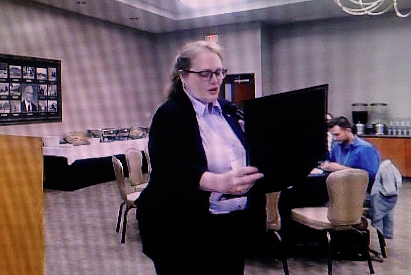 Dr. Julie Harris, coordinator of the Arkansas Phi Alpha Theta Regional Conference at Harding University, announces Anne Adams as the winner of the best undergraduate paper award in world history at the conference luncheon on April 2, 2022.