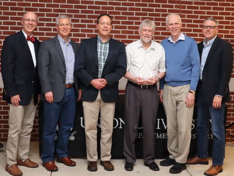 History department faculty members stand with Dr. Terry Lindley (third from right) after recognizing him for his 36 years of service to the department and Union University. They are (left to right) Robert Briley, Dr. David Thomas, Dr. Henry Allen, Dr. Stephen Carls, and Dr. Keith Bates.