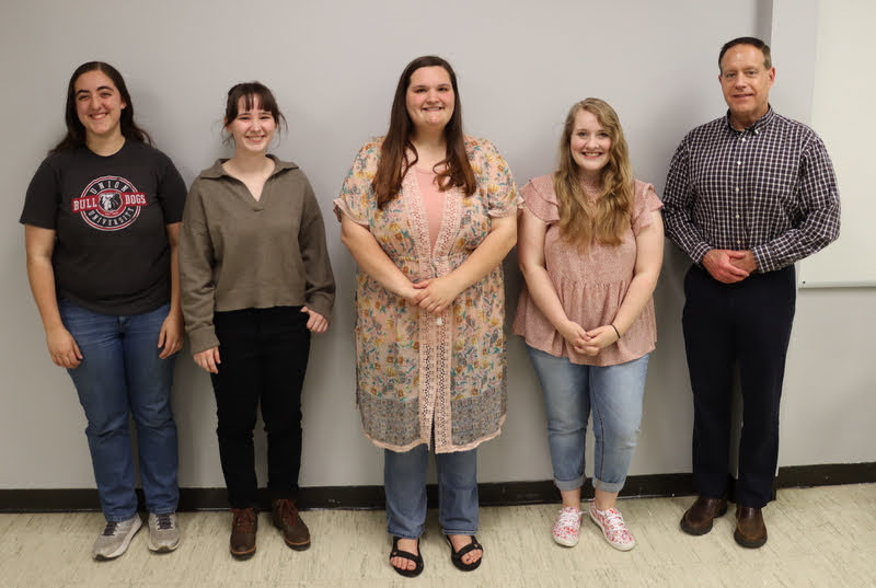 Rutledge Honorary History Club members stand together during the club's spring plenary meeting on April 7, 2022. They are (left to right) Joy Brown, Sophia Keskeys, Sandra Allen, Breanna Edmiston, and Dr. Henry Allen. Photo by Stephen Carls