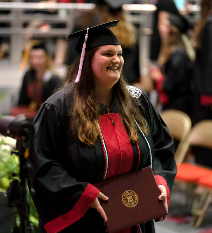 Sandra Allen shows delight after receiving her bachelor of arts diploma at Union's undergraduate commencement ceremony on May 21, 2022. Photo by Kristi Woody