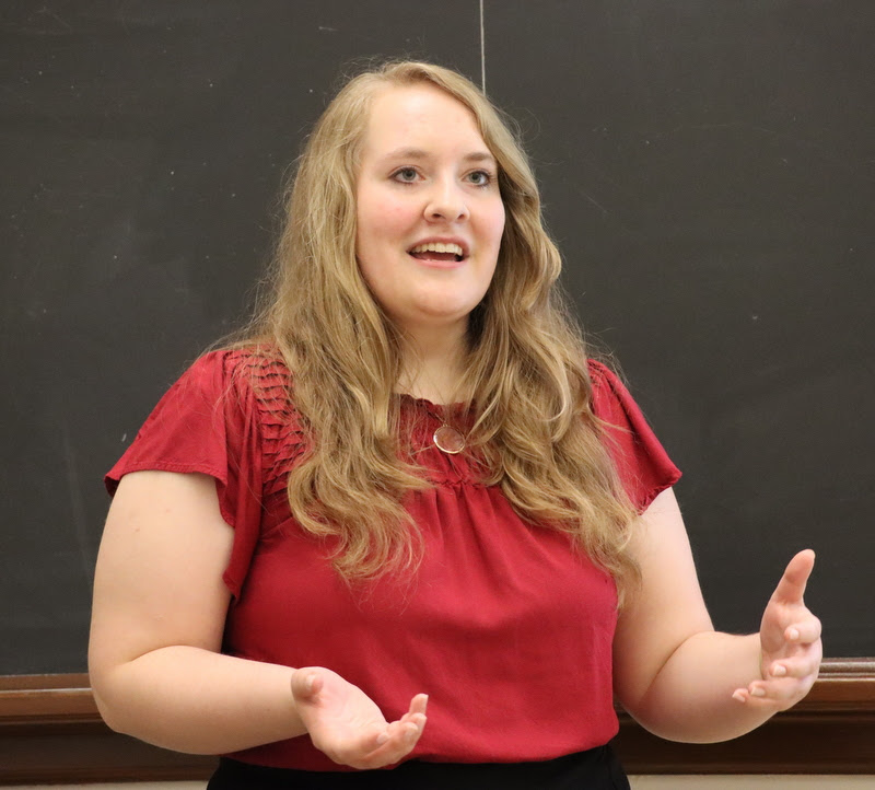 Delta-Psi chapter member Breanna Edmiston presents her paper on 