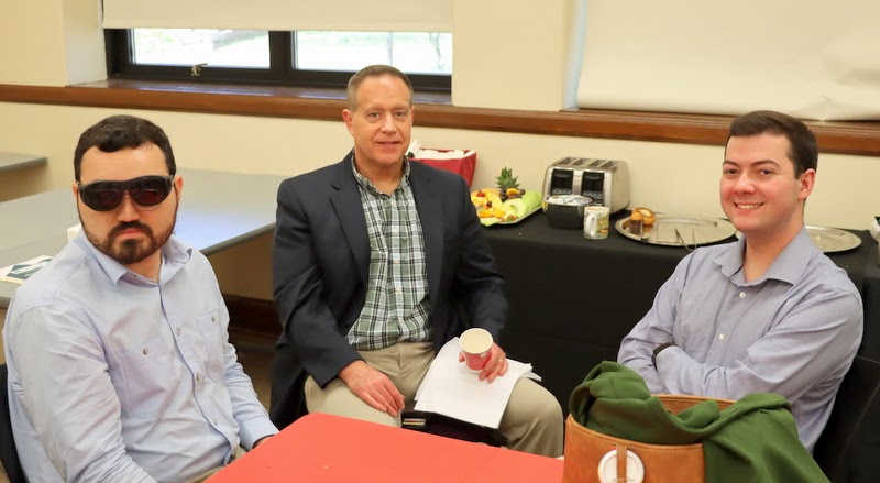 Members of Union's group at the Kentucky Phi Alpha Theta Regional Conference enjoy conversation and snacks during a conference break on April 15, 2023. They are (left to right) Christian Young, Dr. Henry Allen, and Jack Jenkins.