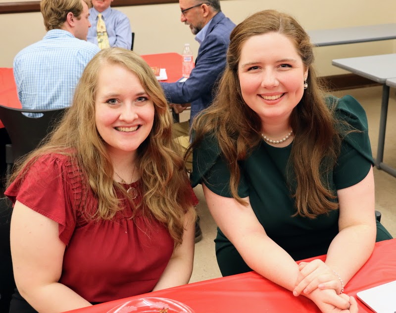 Union students Breanna Edmiston (left) and Abigail Gilbert enjoy a morning break at the Kentucky Phi Alpha Theta Regional Conference on April 15, 2023.