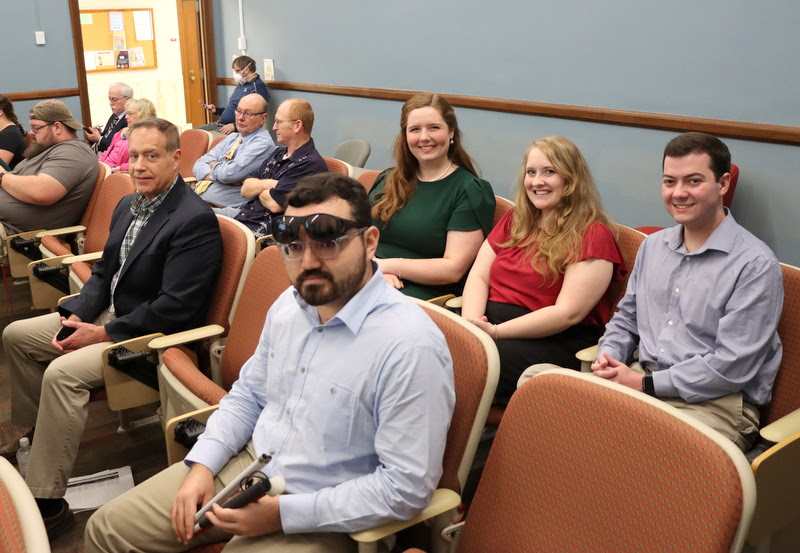 Members of the Union University group at the Kentucky Phi Alpha Theta Regional Convention wait for the conference plenary lecture to begin on the morning of April 15, 2023. They are: (front row on near side of room, left to right) Dr. Henry Allen and Christian Young; (back row on near side of room, left to right) Abigail Gilbert, Breanna Edmiston, and Jack Jenkins.