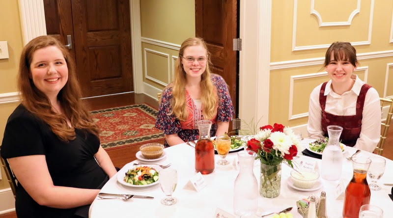 Union students enjoy the start of their meal at the History Department Awards Banquet on April 27, 2023. They are (left to right) Abigail Gilbert, Anna Guelcher, and Sophia Keskeys.