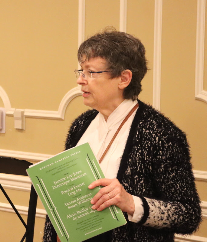 Dr. Alice-Catherine Carls, as the featured speaker at the History Department Awards Banquet, talks about the literary magazine WORLD LITERATURE TODAY during her talk on April 27, 2023. She turned the talk into an award presentation for her husband, retiring department chair Stephen Carls.