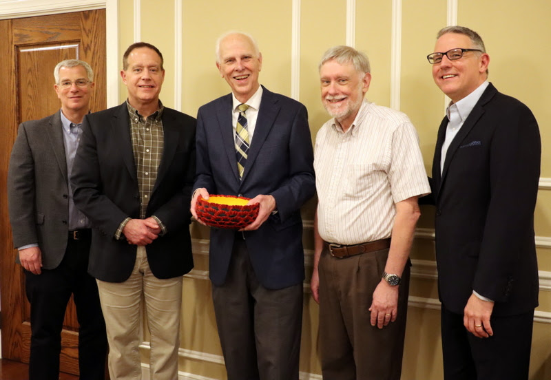 Members of the Union University history department stand with Dr. Stephen Carls (holding the poppies bowl) at the end of the History Department Awards Banquet on April 27, 2023. They are (left to right) Dr. David Thomas, Dr. Henry Allen, Dr. Terry Lindley, and Dr. Keith Bates.