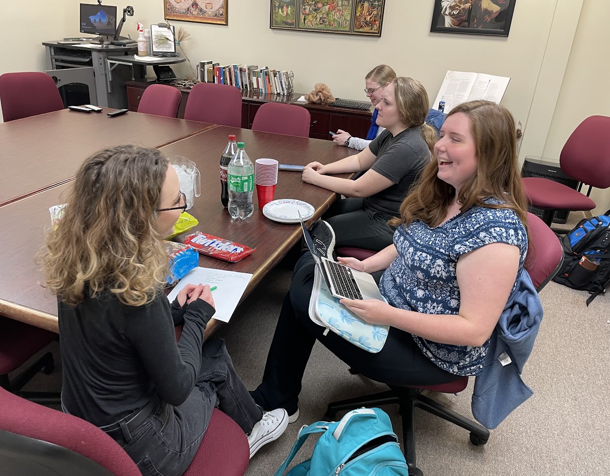 History Club members enjoy their time together at the club's spring meeting and movie night on March 15, 2023. They are (starting on the left front and going counter-clock-wise) Anna Williams, Abigail Gilbert, Breanna Edmiston, and Anna Guelcher.