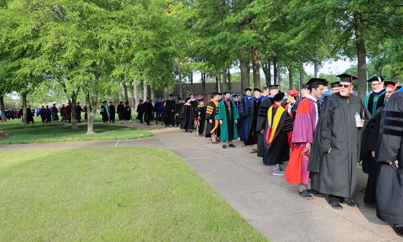 Union University faculty members participate in the processional at the school's undergraduate commencement ceremony on May 6, 2023.