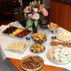 Numerous items adorn the food table at the History Department Welcome Reception at Dr. Stephen Carls's home on September 9, 2019.