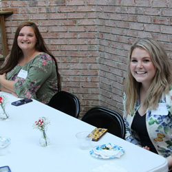 History majors Sandra Allen (left) and Alex Barger smile for the camera at the History Welcome Reception on September 9, 2019.