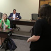 Phi Alpha Theta member Faith Bagley answers a question about Civil War prison camps