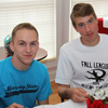 Phi Alpha Theta members Devin Dean (left) and Stephen Lewoczko relax at the 23rd Annual Phi Alpha Theta/History Department Cookout at Dr. Stephen Carls's home on May 8, 2015.