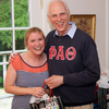 Dr. Stephen Carls presents an award bag to graduating history major and Phi Alpha Theta member Hannah Jones at the history department's annual cookout on May 8, 2015.