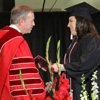 History major and Phi Alpha Theta member Faith Bagley receives her BA diploma from Union University President Dr. Samuel W. Oliver at Union University's commencement exercises on May 16, 2015.