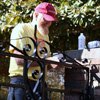 David Ragland paints the entry gate to Salem Cemetery as a member of the Phi Alpha Theta-sponsored team that did a community service project at the cemetery on November 1, 2016. Photo by Elizabeth Wilson