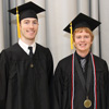 Phi Alpha Theta members Luke Adkins (left) and Gideon Ragland stand together prior to Union University's fall semester commencement exercises on December 17, 2016.