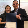 Dr. Keith Bates presents to Emily Littleton on April 3, 2017, the second place certificate in the American history category that she won at the Tennessee Phi Alpha Theta Regional Conference on April 1. Littleton was unable to attend the awards ceremony at the conference.