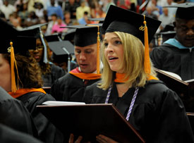 Megan Clampitt, of Jackson, Tenn., the first recipient of Union University's Master of Science in Nursing - nurse anesthesia degree, sings the "Alma Mater" at the close of the Aug. 2 graduation ceremony held on Union's campus. (Photo by Jim Veneman)